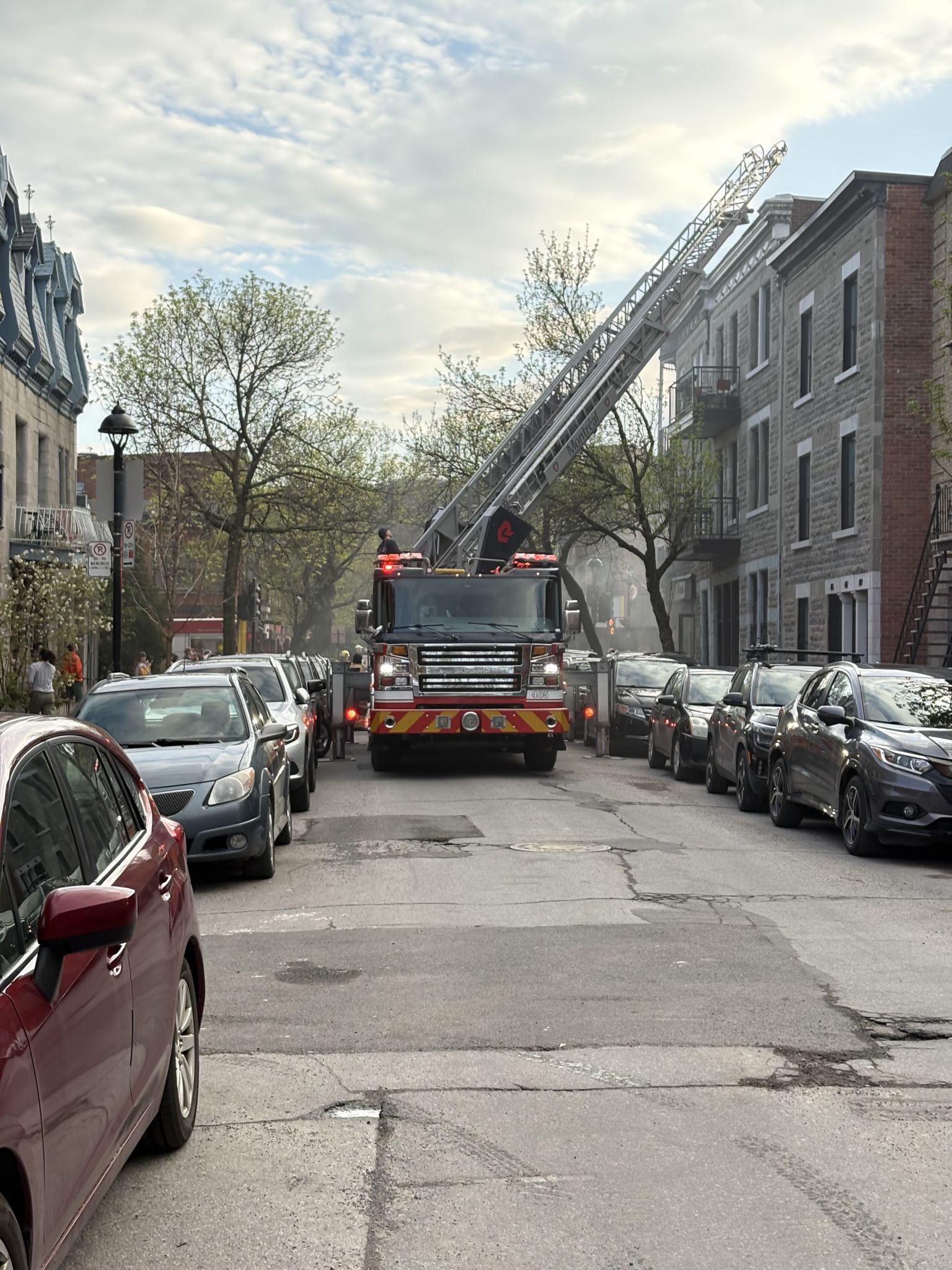 Fire engine putting out a fire in Plateau-Mont-Royal