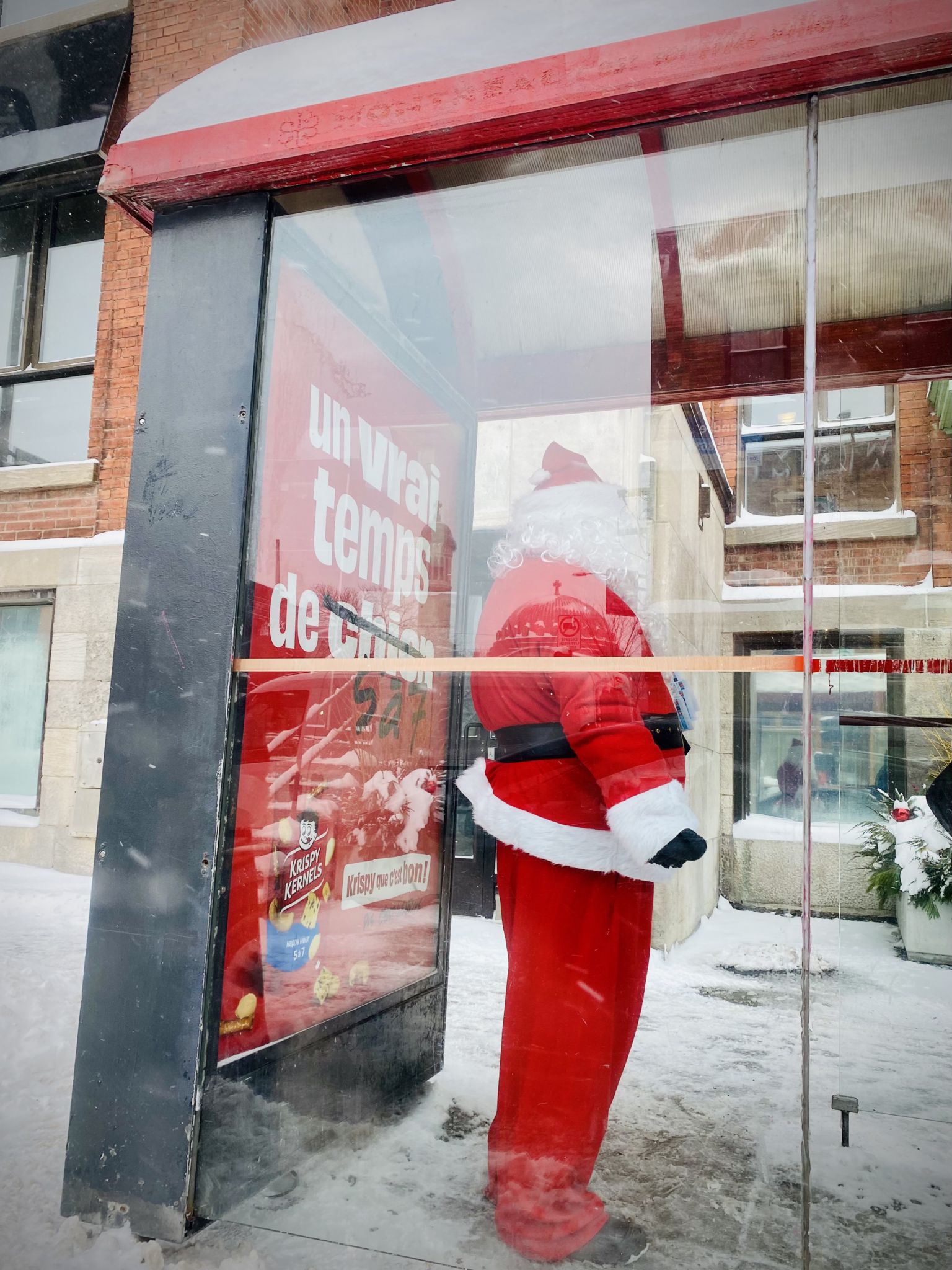 Santa Claus waiting for the bus